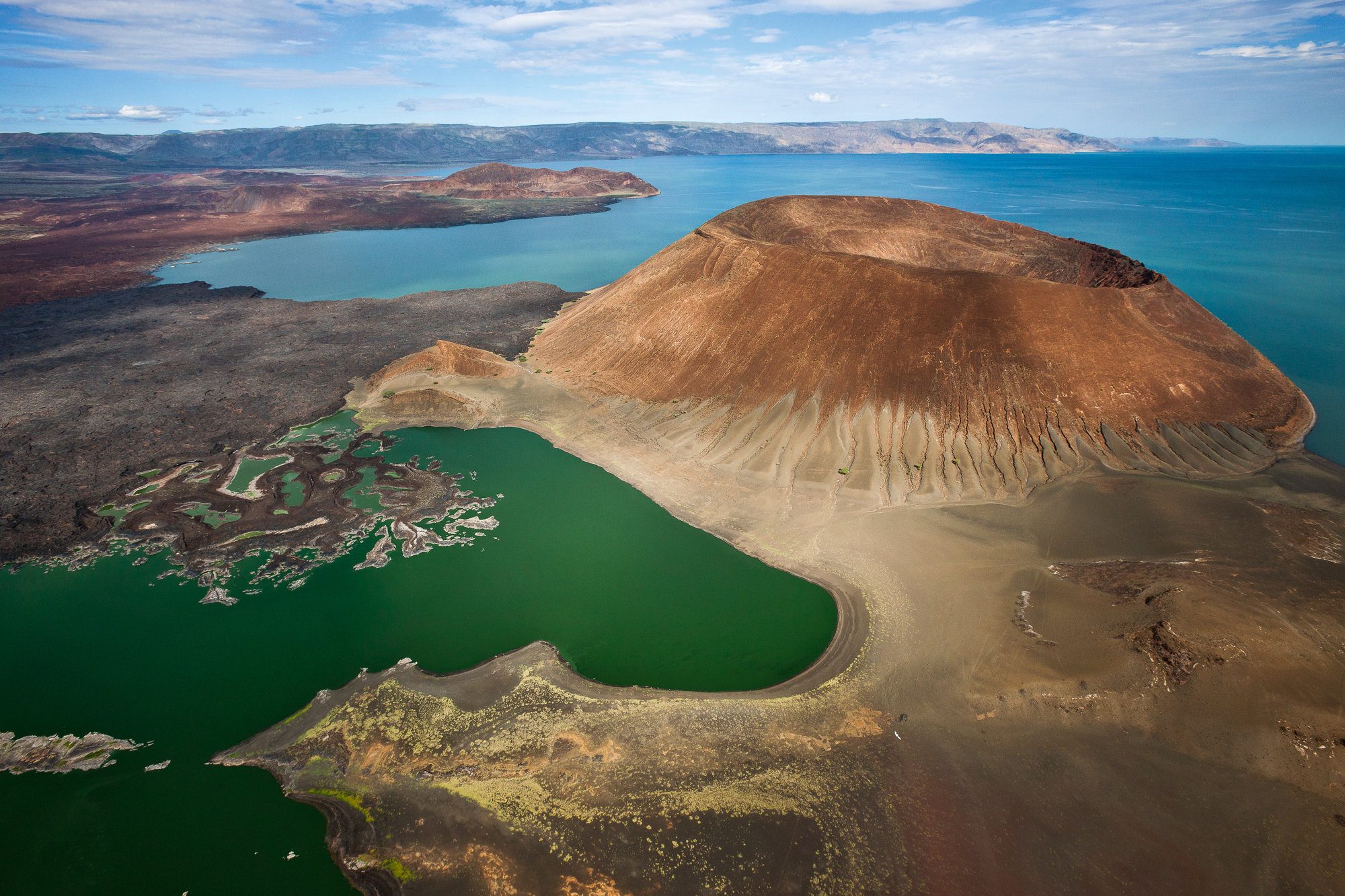 Lake Turkana from the air: a crater lake beside the jade water, Koros Camp's country