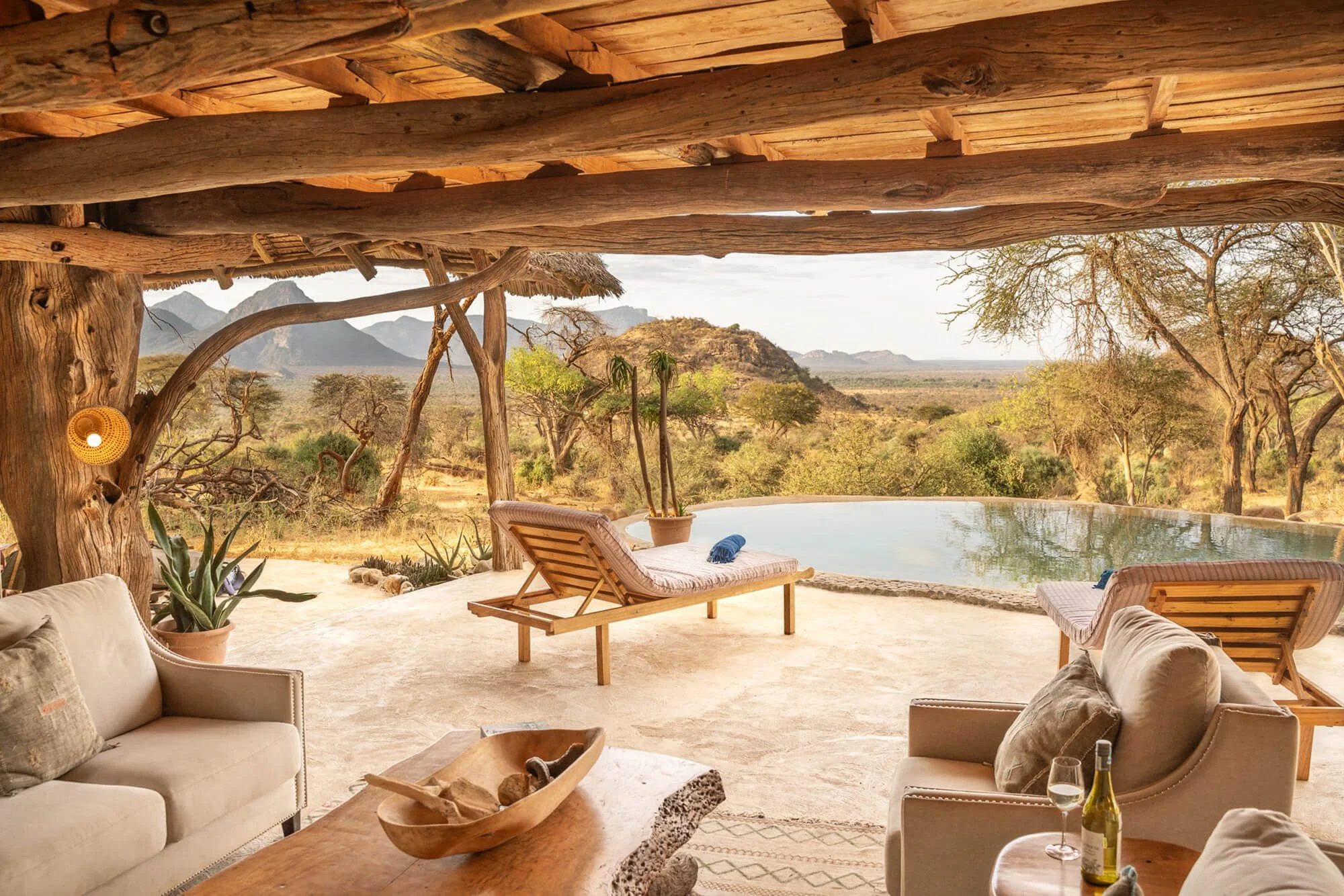The lounge deck and pool at Sarara Camp, looking out to the Mathews Range